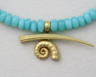 Tust shell and Spirula in 18K gold on Andean Opal rondelles